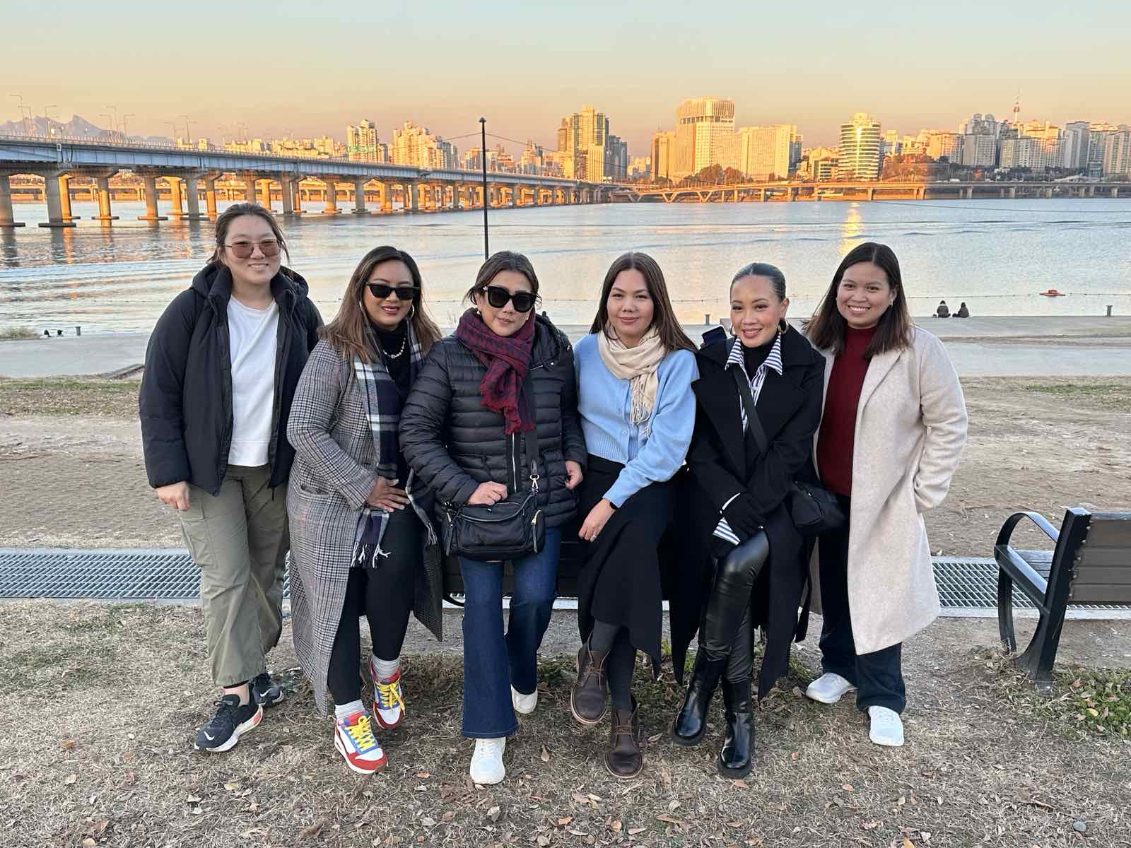 Videographer Kim Wee Ebol, People section editor Grace Libero-Cruz, Metro head Christina N. Lopez, editor-chief Geolette Esguerra, Beauty & Wellness editor Kate Paras-Santiago, and business manager Nona Baldo at the Yeouido Hangang Park